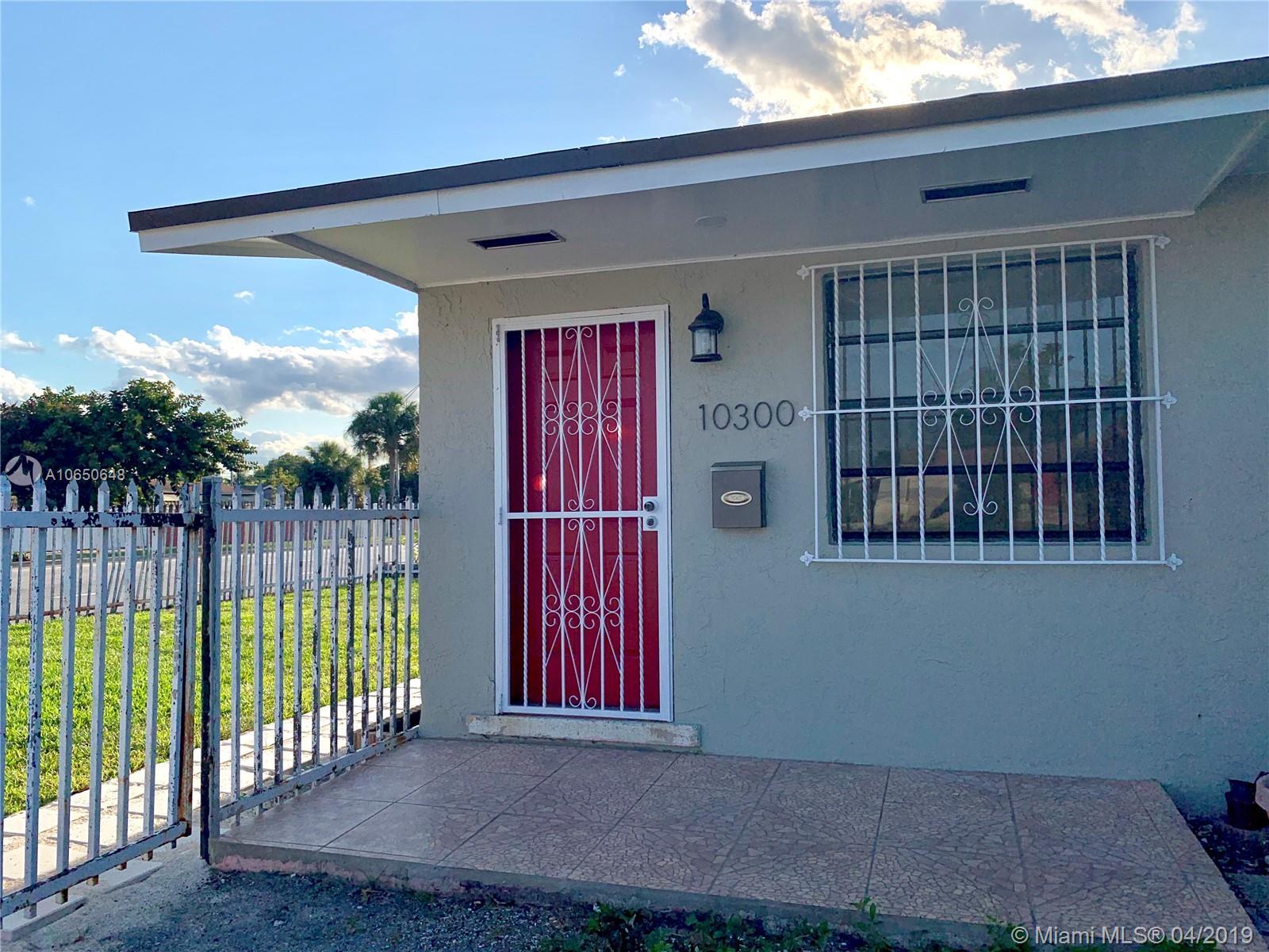 Property Photo: 10300 NW 35th Ct FL 33147