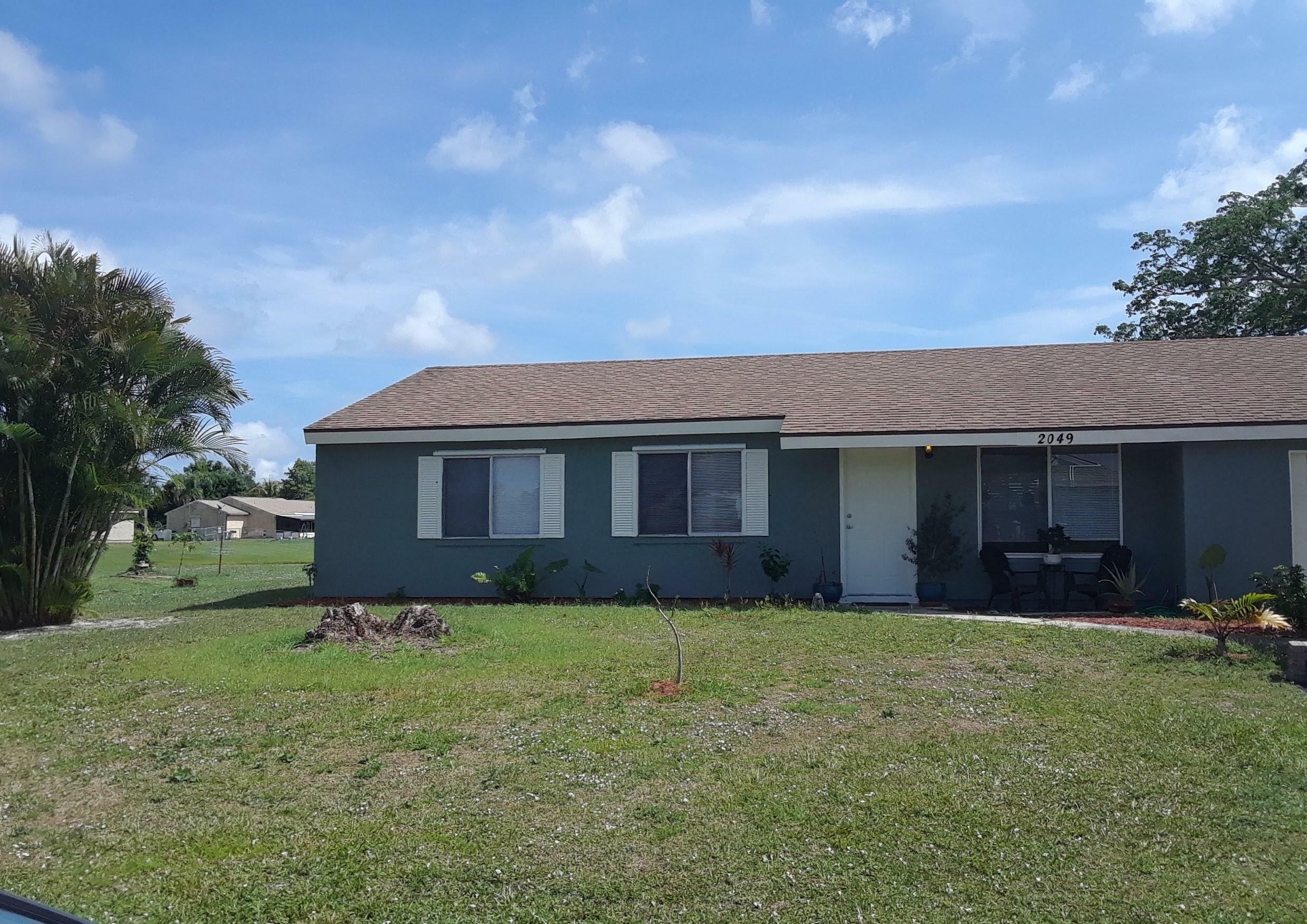 Property Photo:  2049 SE Parkwood Circle  FL 34953 