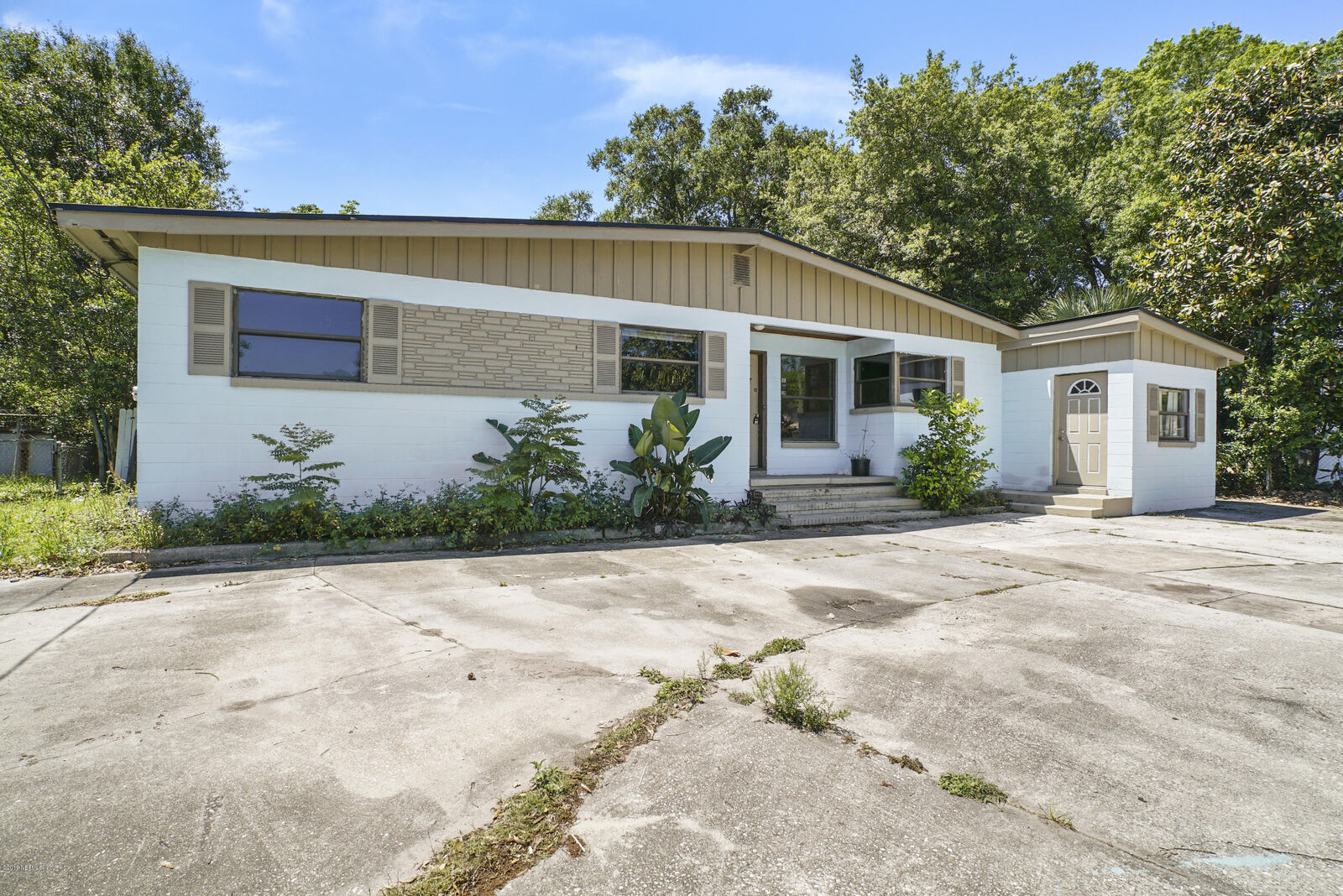 Property Photo:  6300 Merrill Road  FL 32277 