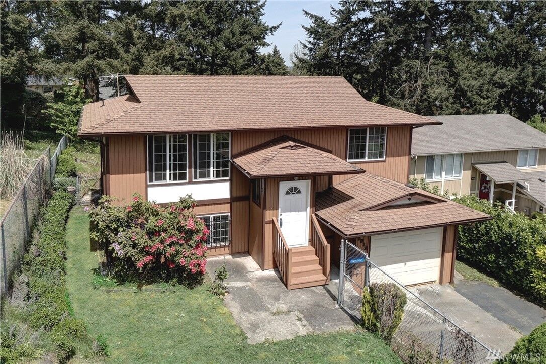 Property Photo:  1213 E 60th St  WA 98404 