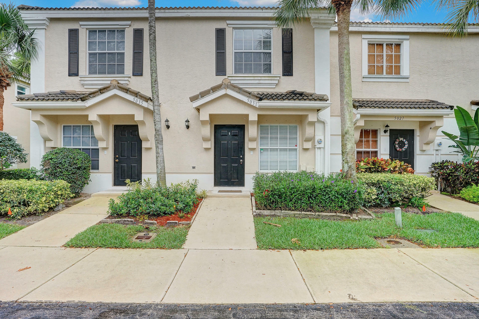 Property Photo:  5031 Palmbrooke Circle  FL 33417 