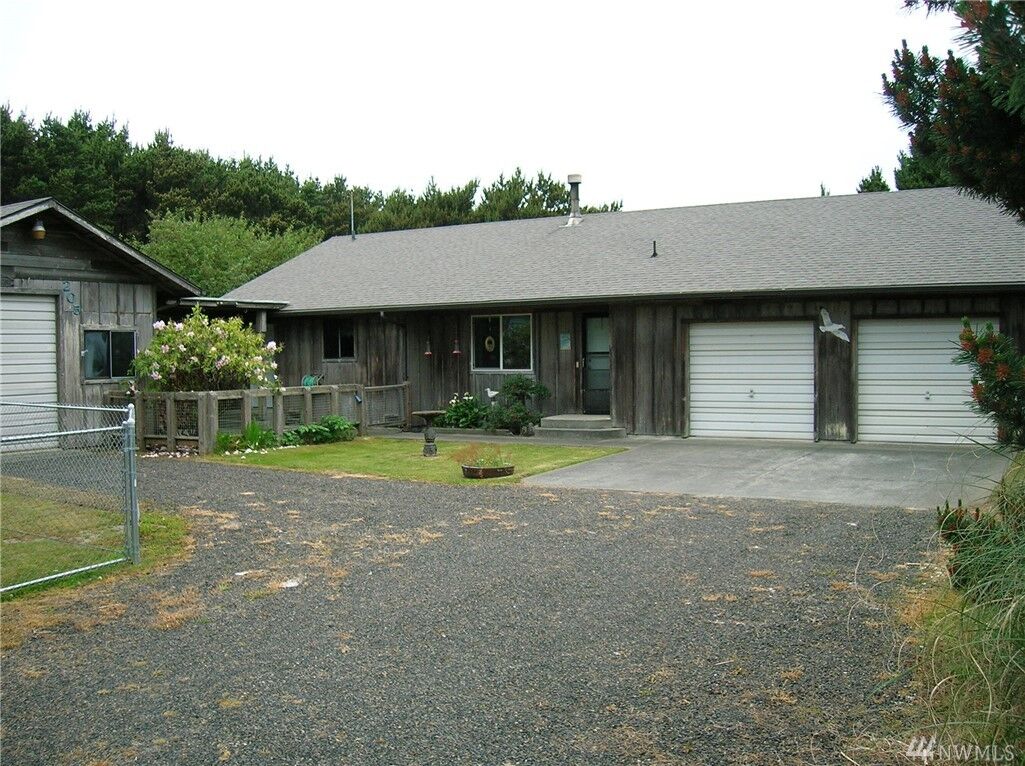 Property Photo:  205 W Wind Sand Lane  WA 98547 