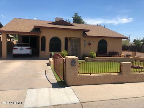 Property Photo:  9153 W Garfield Street  AZ 85353 