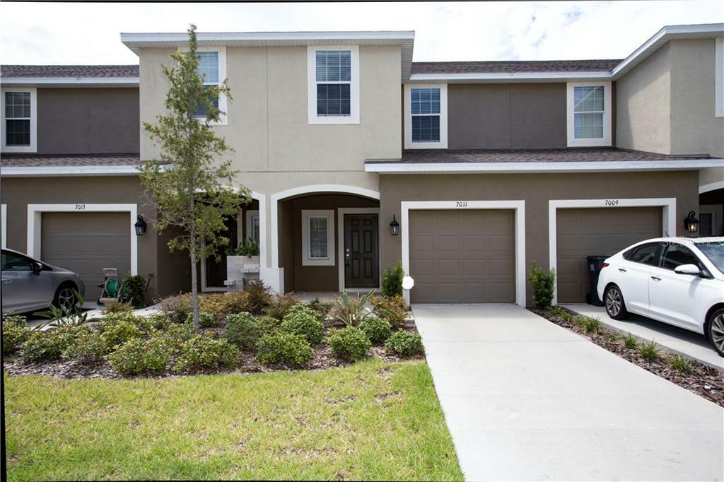 Property Photo: 7011 Woodchase Glen Drive FL 33578