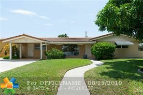 Property Photo:  5870 NE 21st Ln  FL 33308 