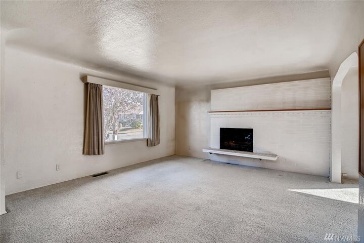Property Photo:  7848 S Ainsworth Ave  WA 98408 