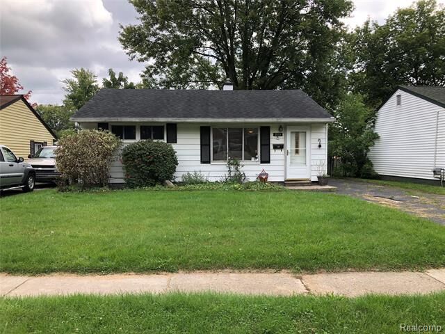 Property Photo:  233 W Hopkins Avenue  MI 48340 