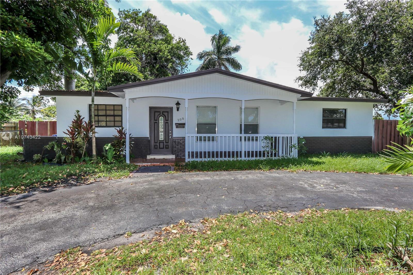 Property Photo:  200 SW 64th Way 200  FL 33023 