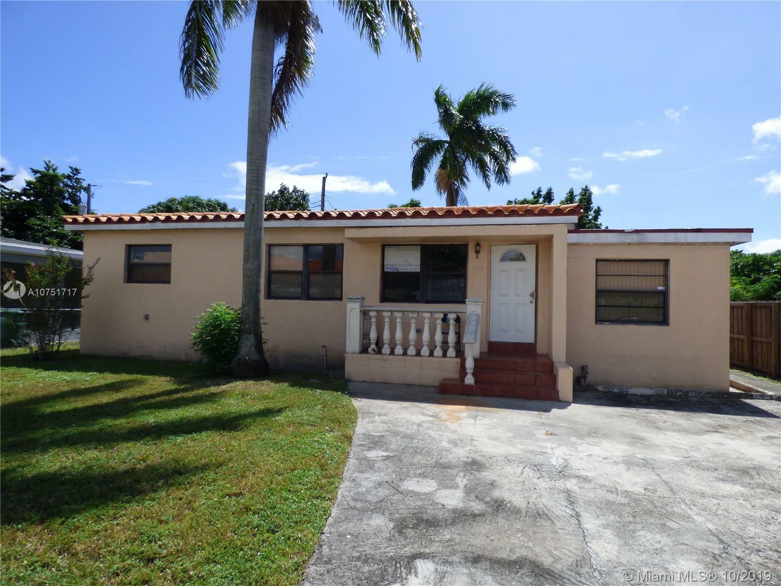 Property Photo:  1040 NW 118th St  FL 33168 