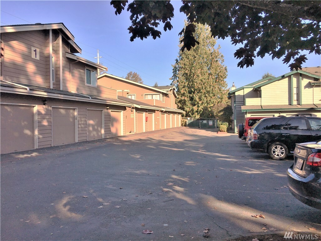 Property Photo:  8407 18th Ave W 1-103  WA 98204 