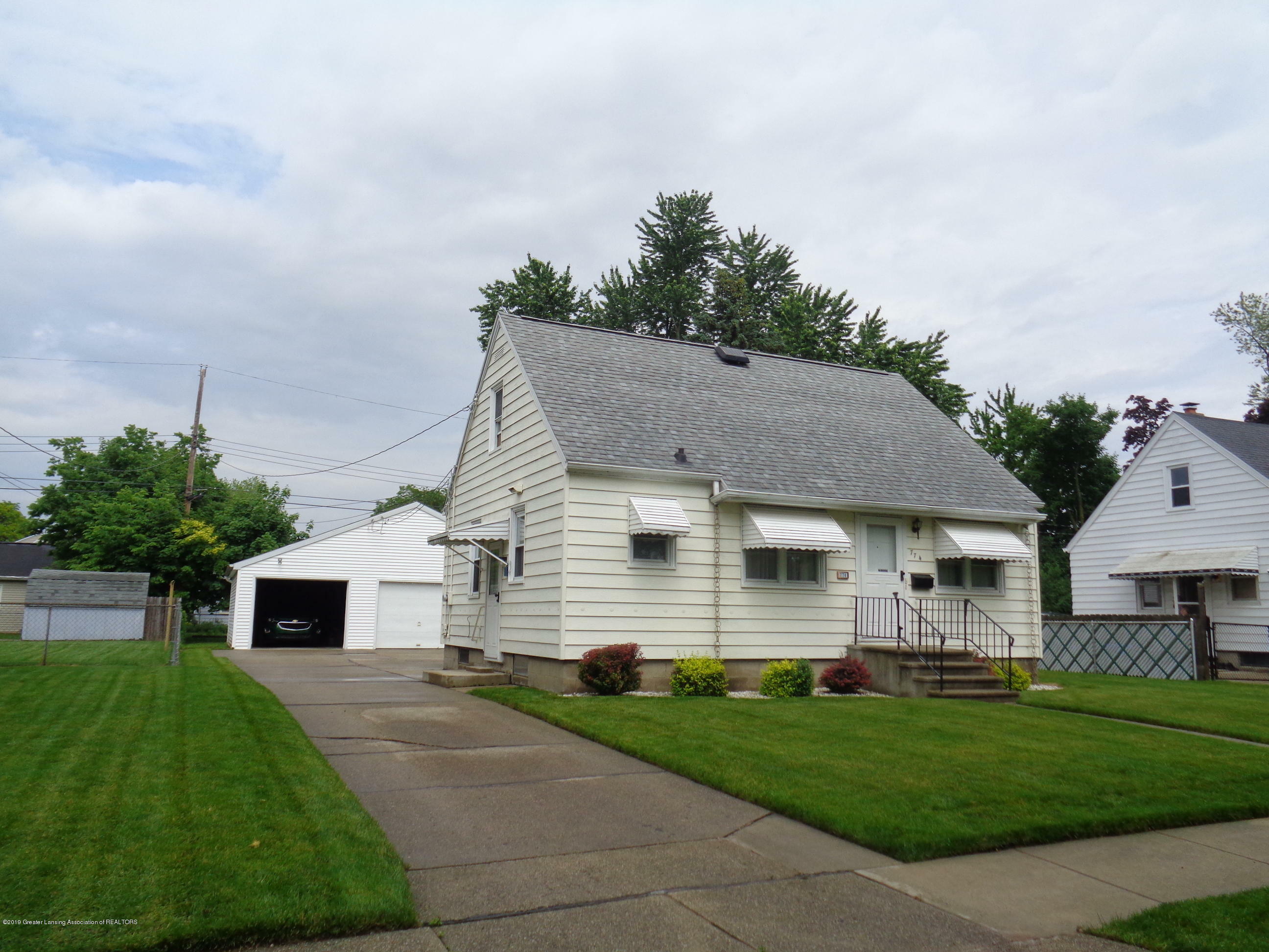 Property Photo:  774 Fitting Avenue  MI 48917 