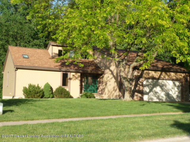 Property Photo:  1402 Westport Drive  MI 48917 