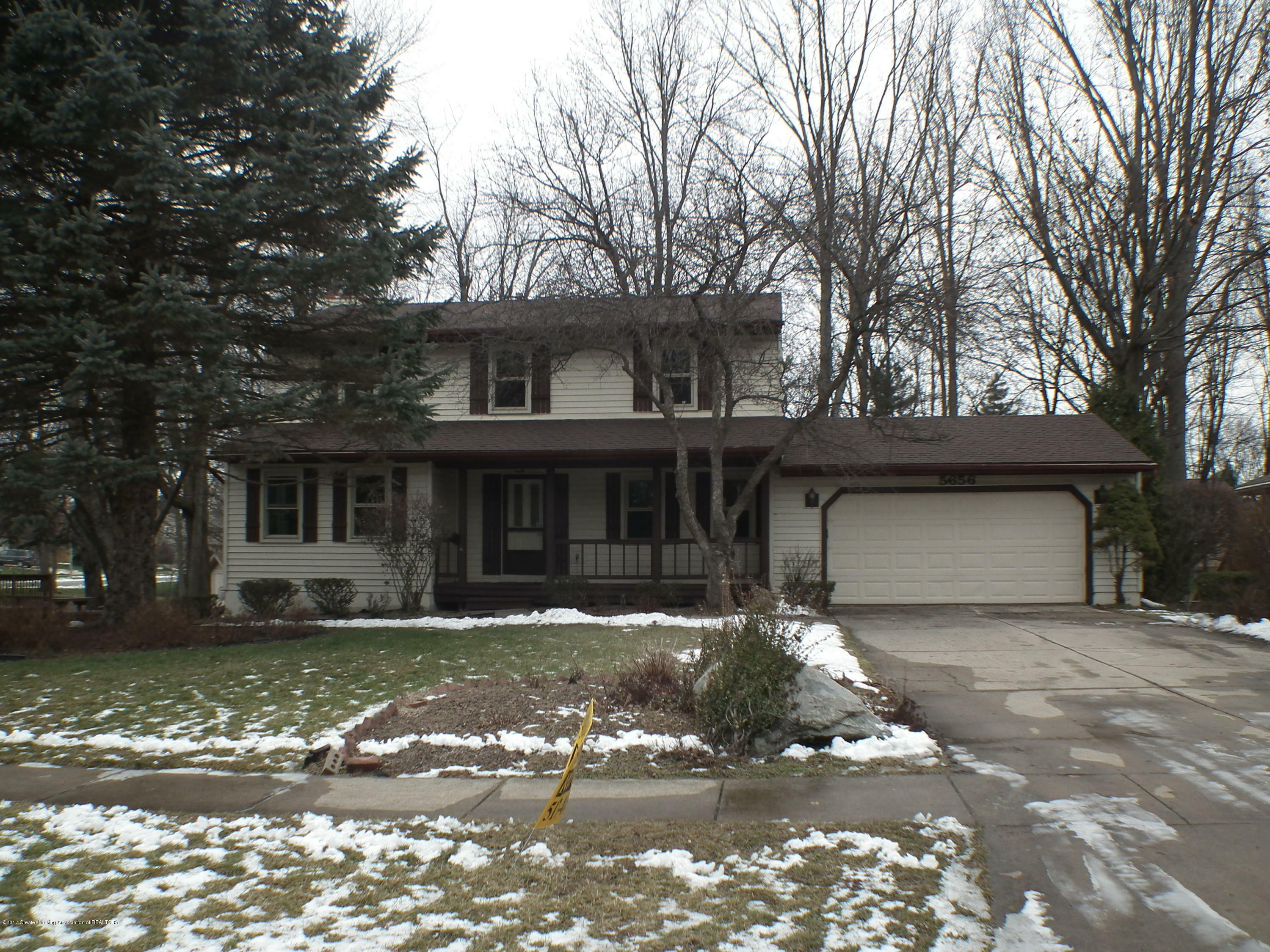 Property Photo:  5656 Woodstock Drive  MI 48917 