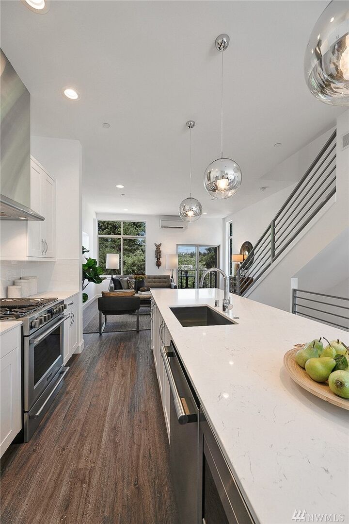 Property Photo:  18260  73rd Avenue NE 103  WA 98028 