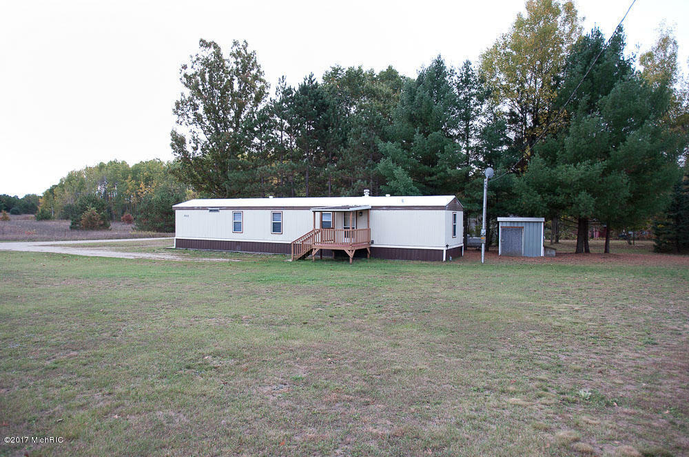 Property Photo:  8013 11 Mile Rd  MI 49332 