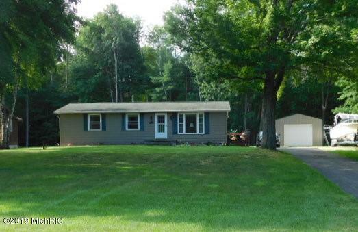 Property Photo:  451 Birchwood Drive  MI 49660 