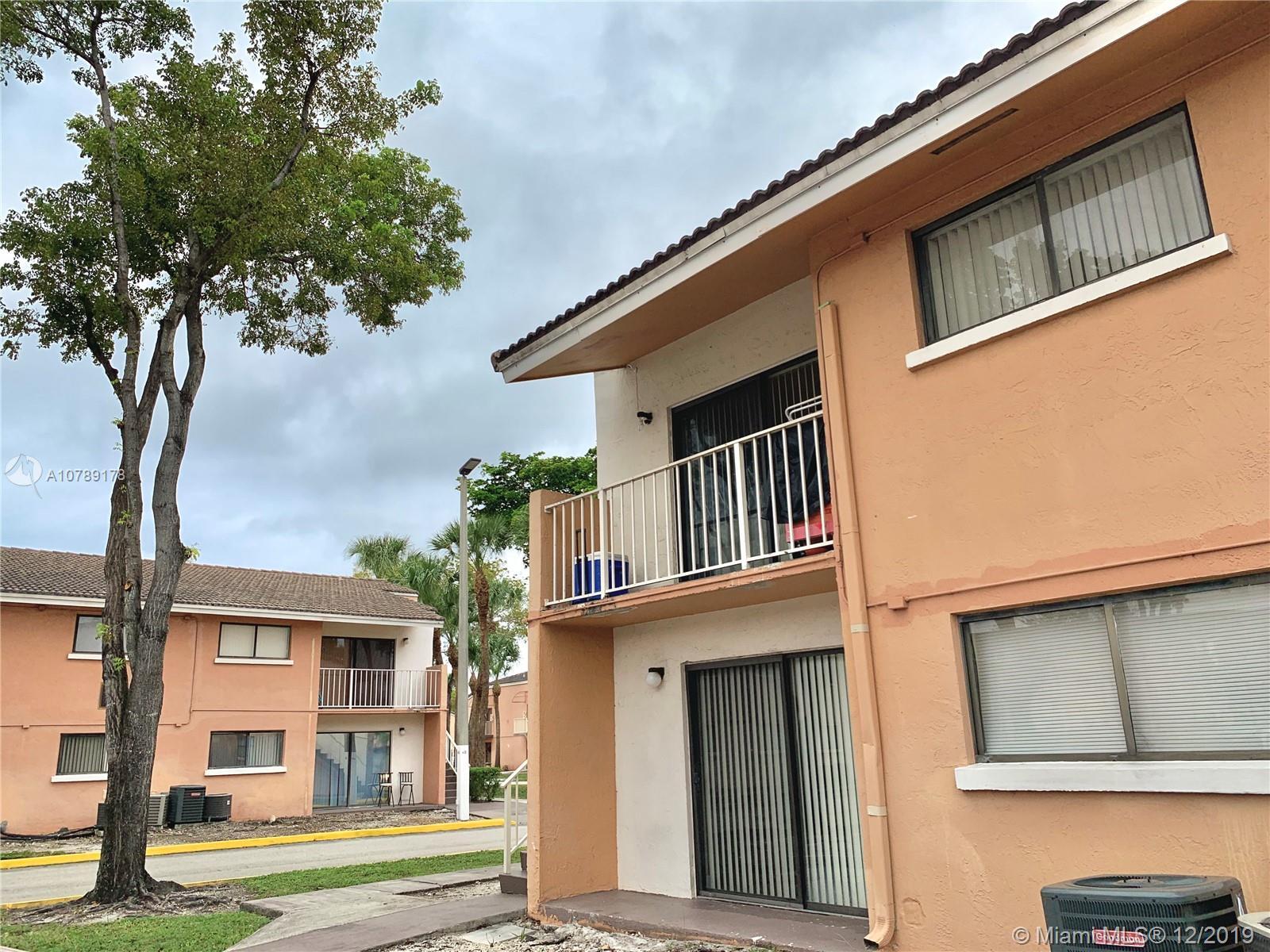 Property Photo: 7040 NW 179th St 206 FL 33015