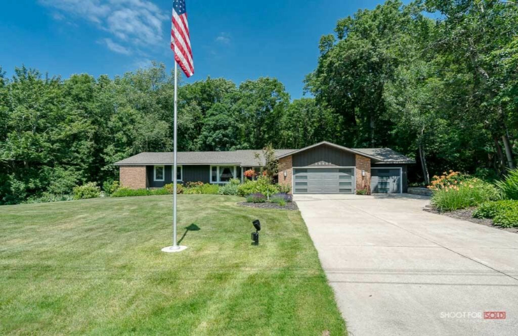 Property Photo:  18527 Iroquois Drive  MI 49456 