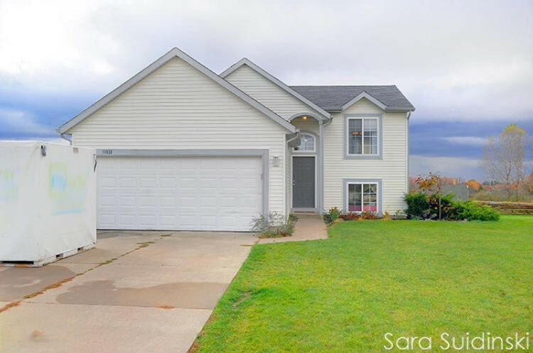 Property Photo:  11830 Barkton Drive  MI 49424 