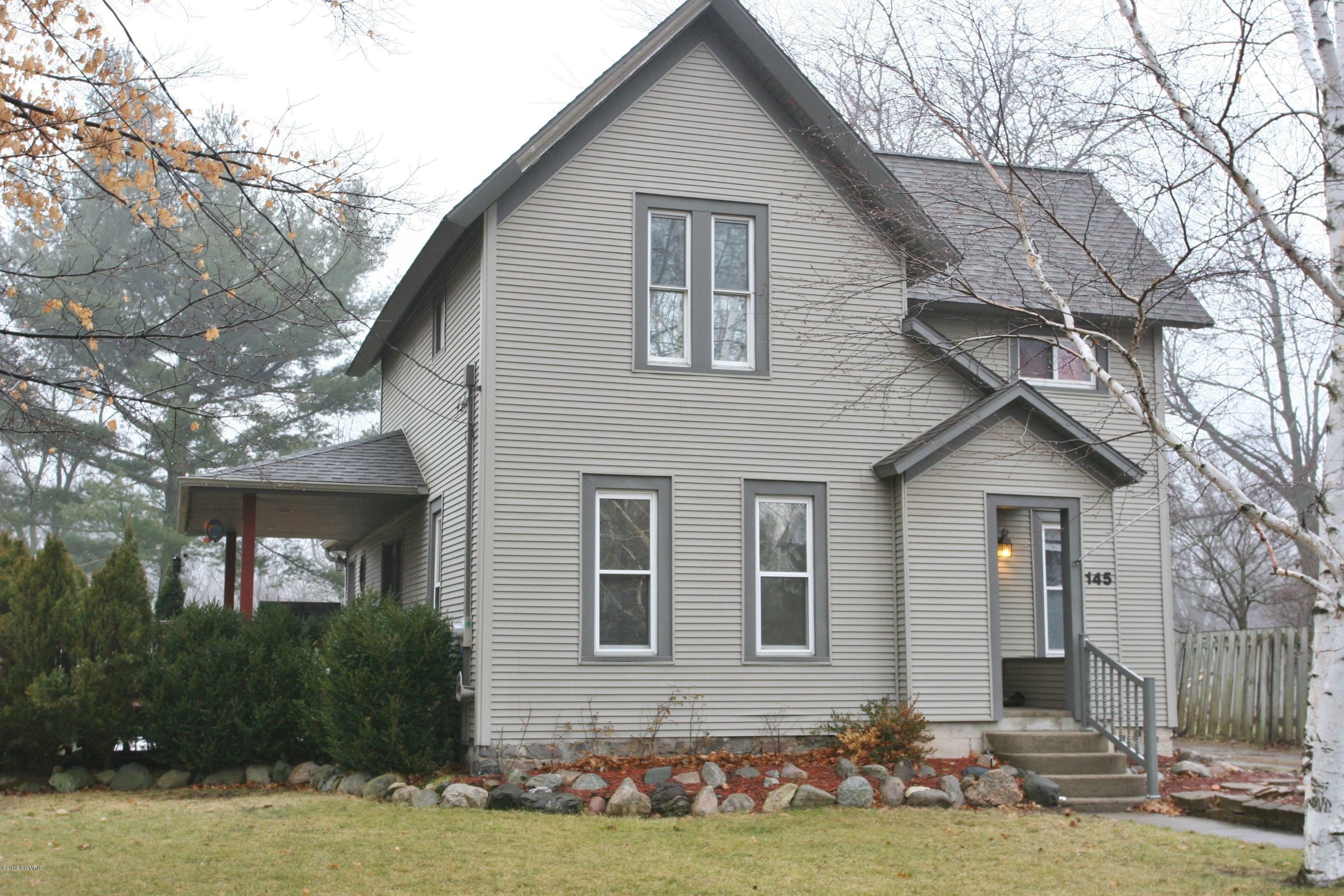 Property Photo:  145 W Division  MI 49345 