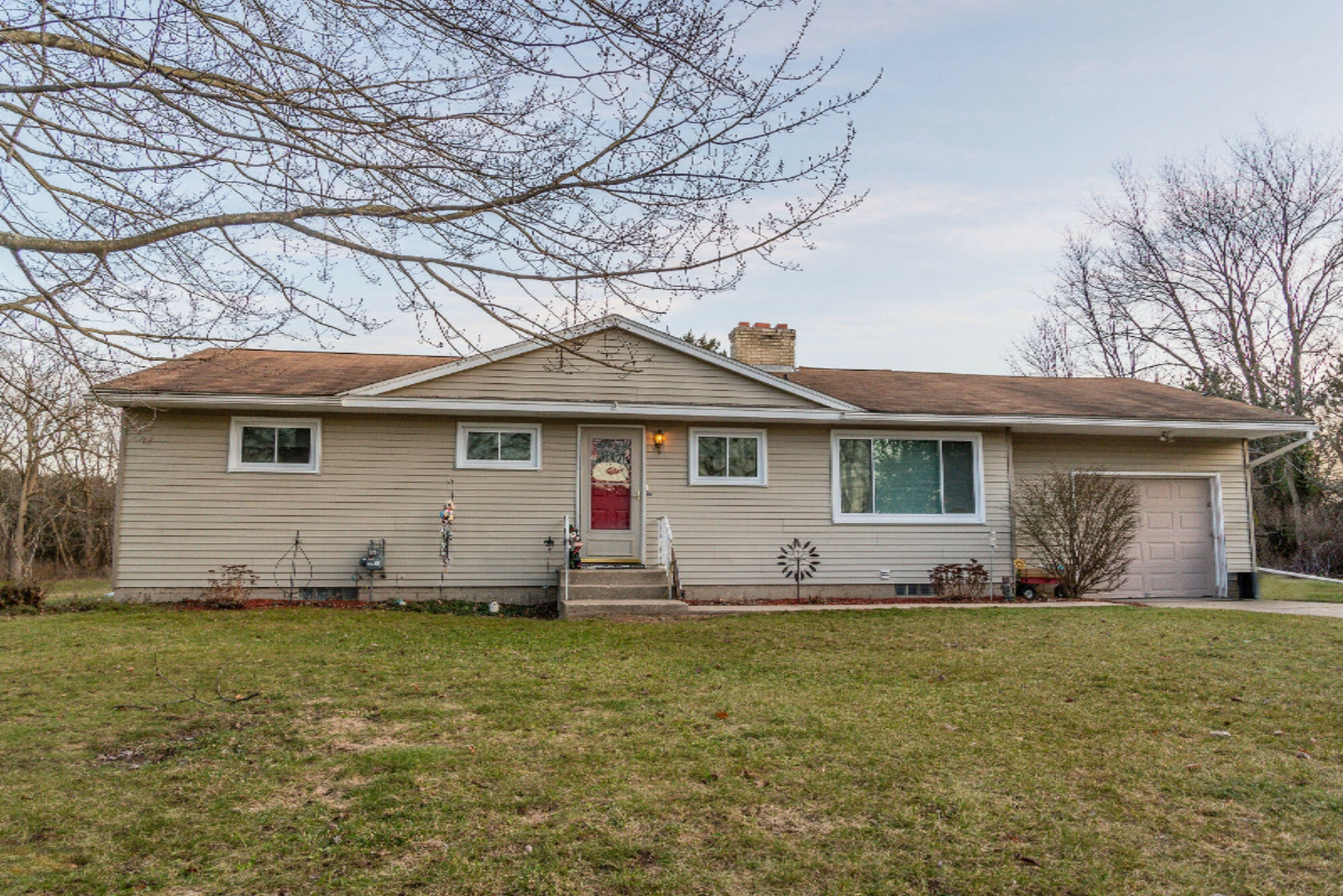 Property Photo:  1140 Wilshire Drive  MI 49461 