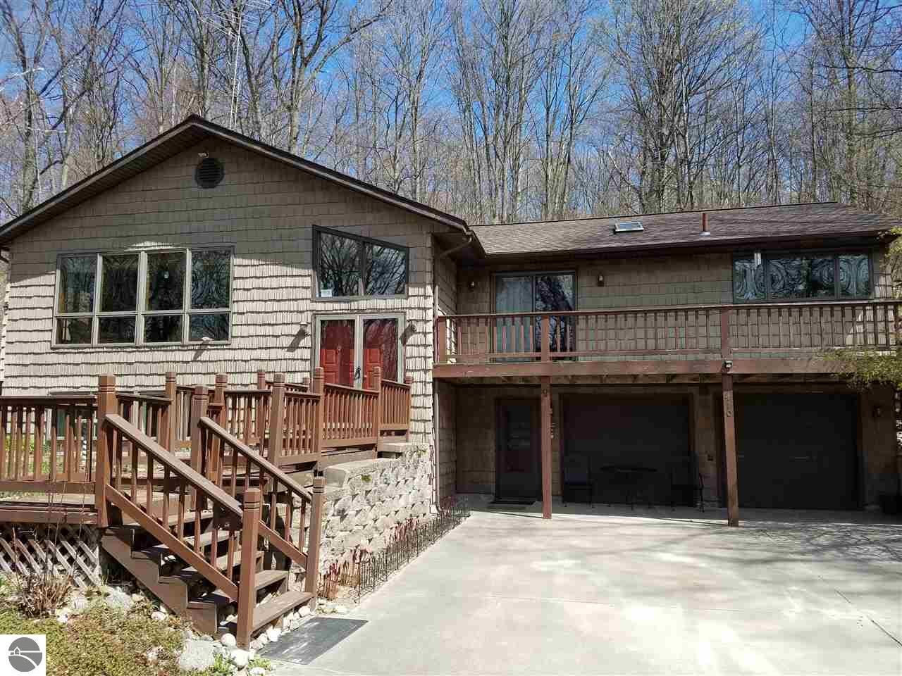 Property Photo:  410 W 18 Road  MI 49668 