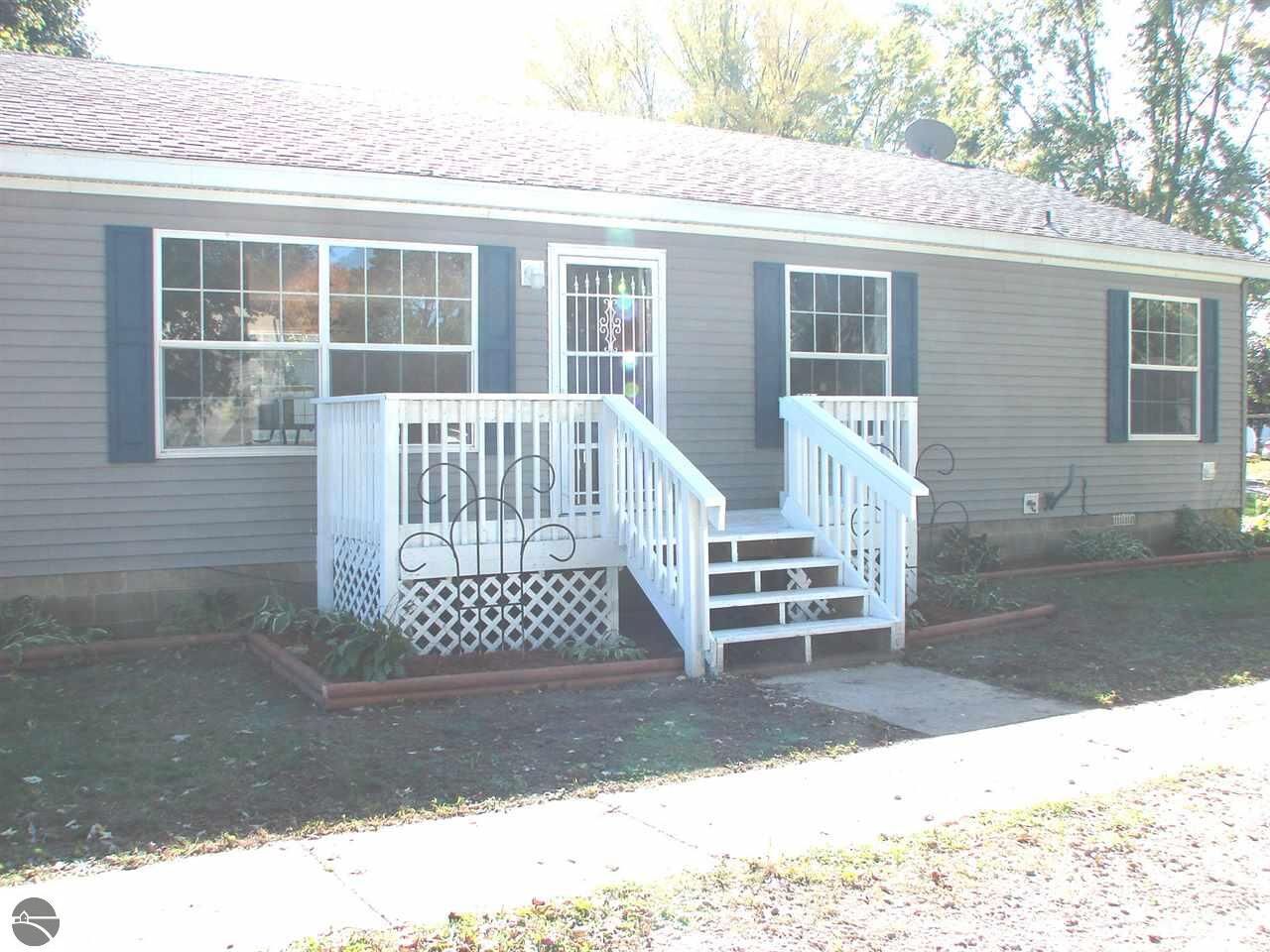 Property Photo:  121 W Fulton  MI 48871 