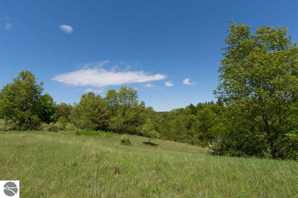 Property Photo:  S Kitlinger Road  MI 49630 