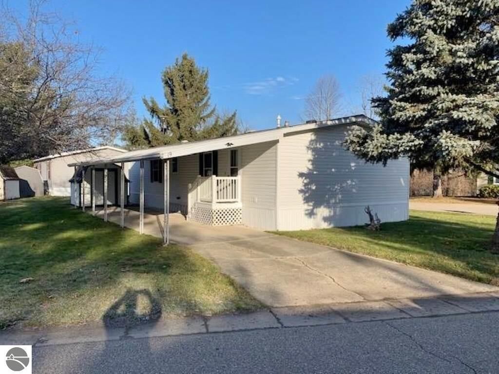 Property Photo:  19 Balsam Drive  MI 48880 