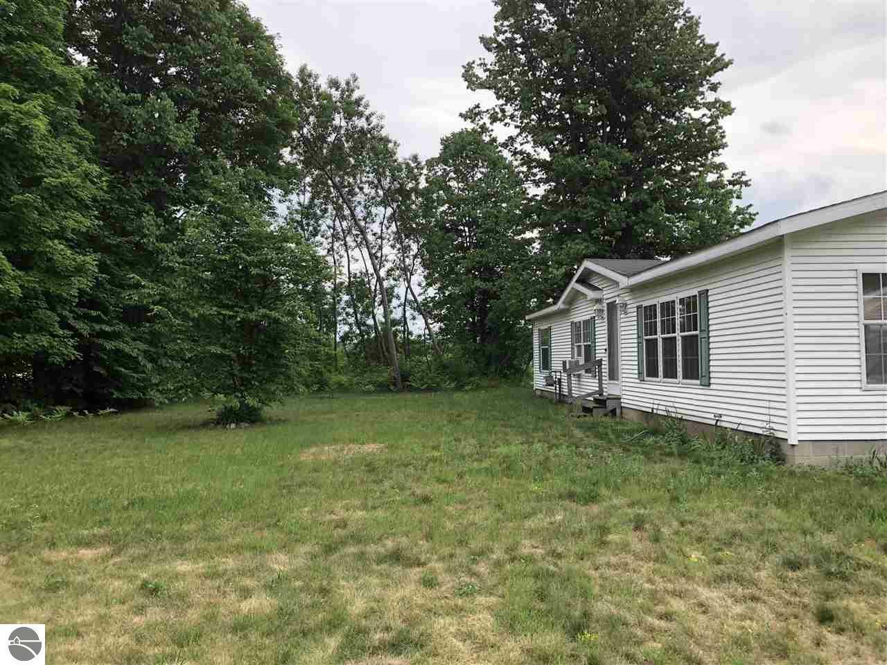 Property Photo:  2754 Adam Lane  MI 49637 