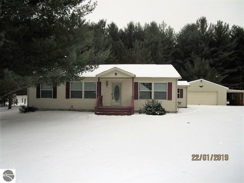 Property Photo:  2800 S Wise Road  MI 48858 