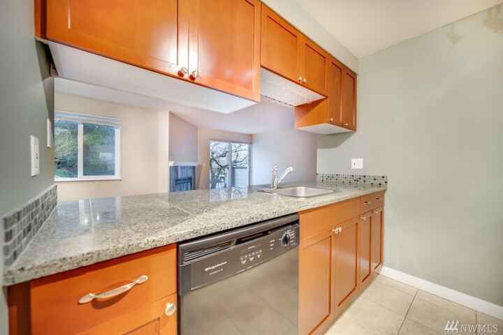 Property Photo:  4831 Fauntleroy Wy SW 203  WA 98136 