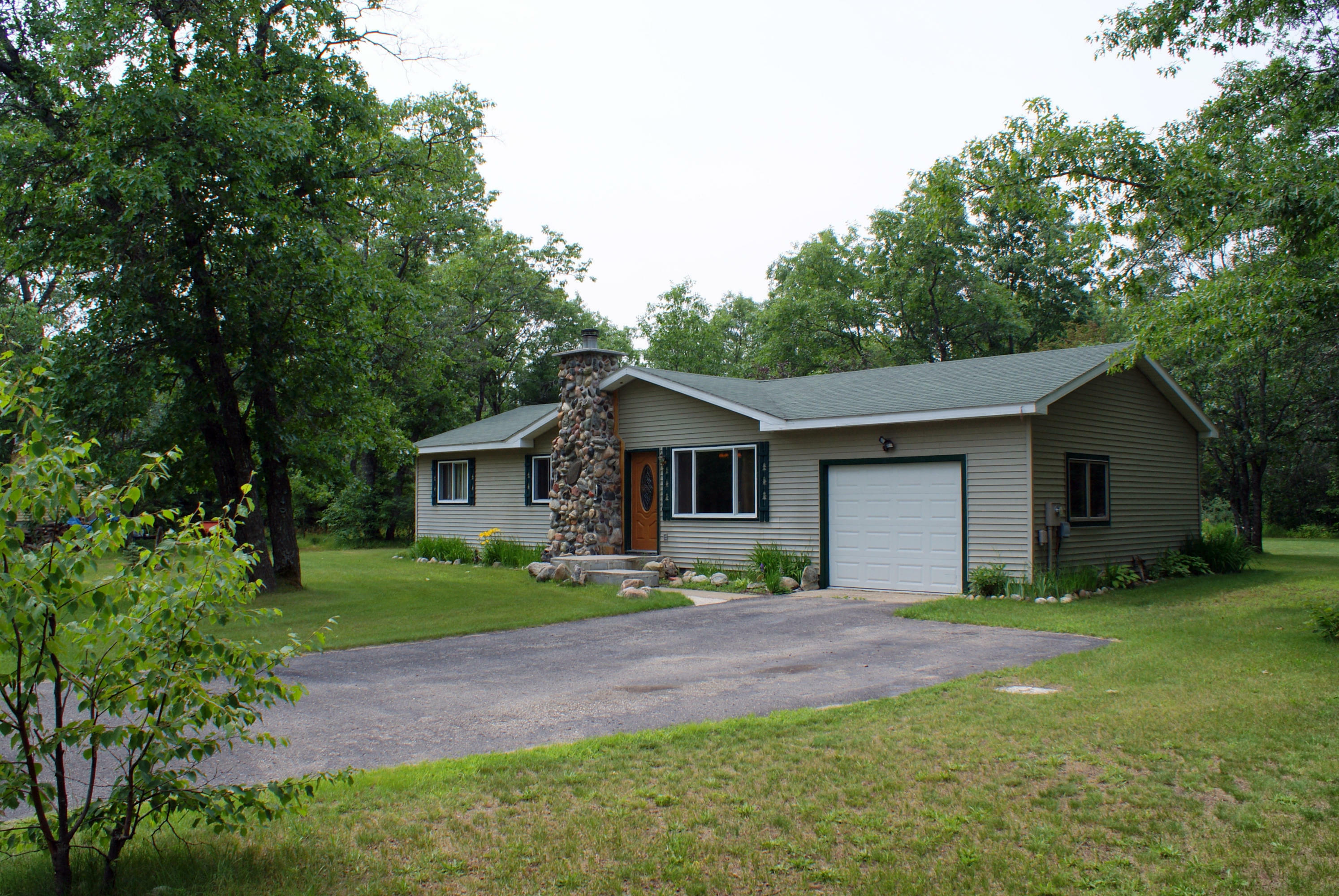 Property Photo:  7226 Tuscarora Circle  MI 49749 