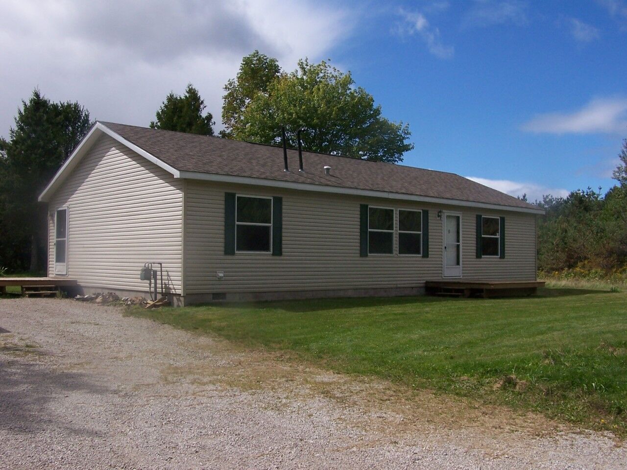 Property Photo:  8965 Outback Alley  MI 49721