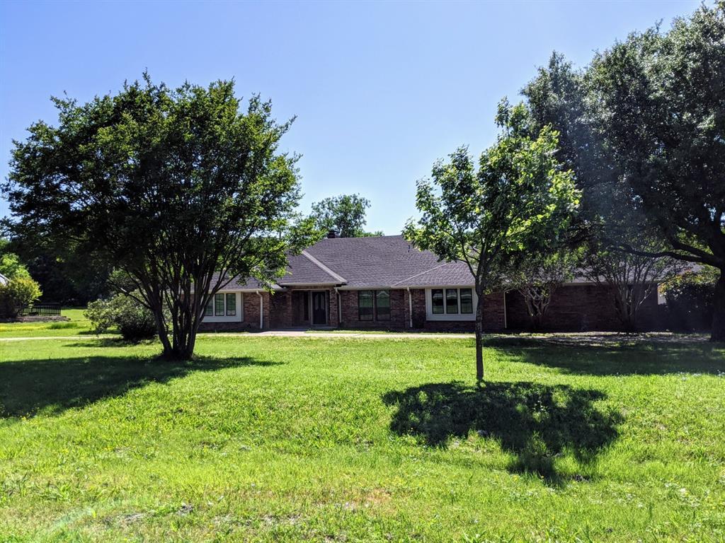 Property Photo:  202 Windy Lane  TX 75087 
