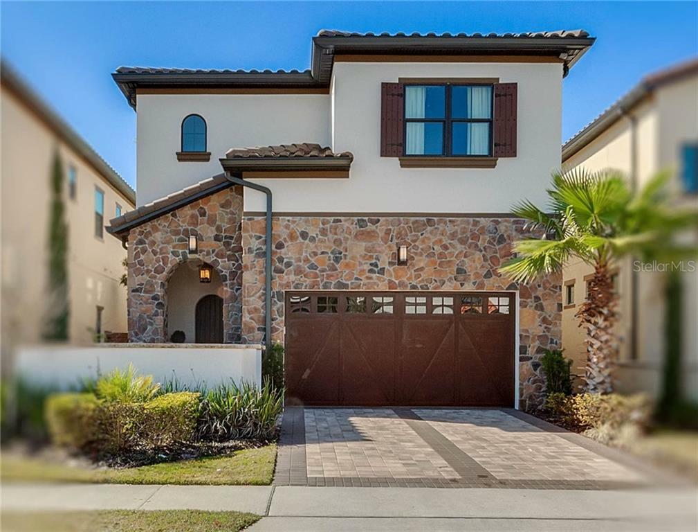 Property Photo: 8329 Via Vittoria Way FL 32819