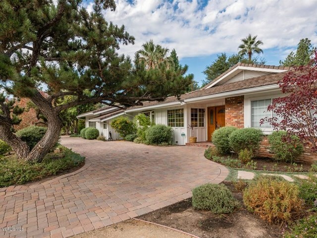 Property Photo:  6151 Woodlake Avenue  CA 91367 