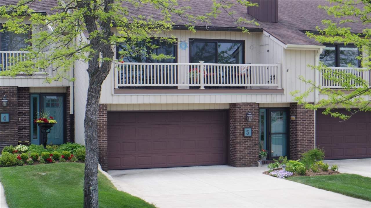 Property Photo: 1287 La Chaumiere #5 MI 49770
