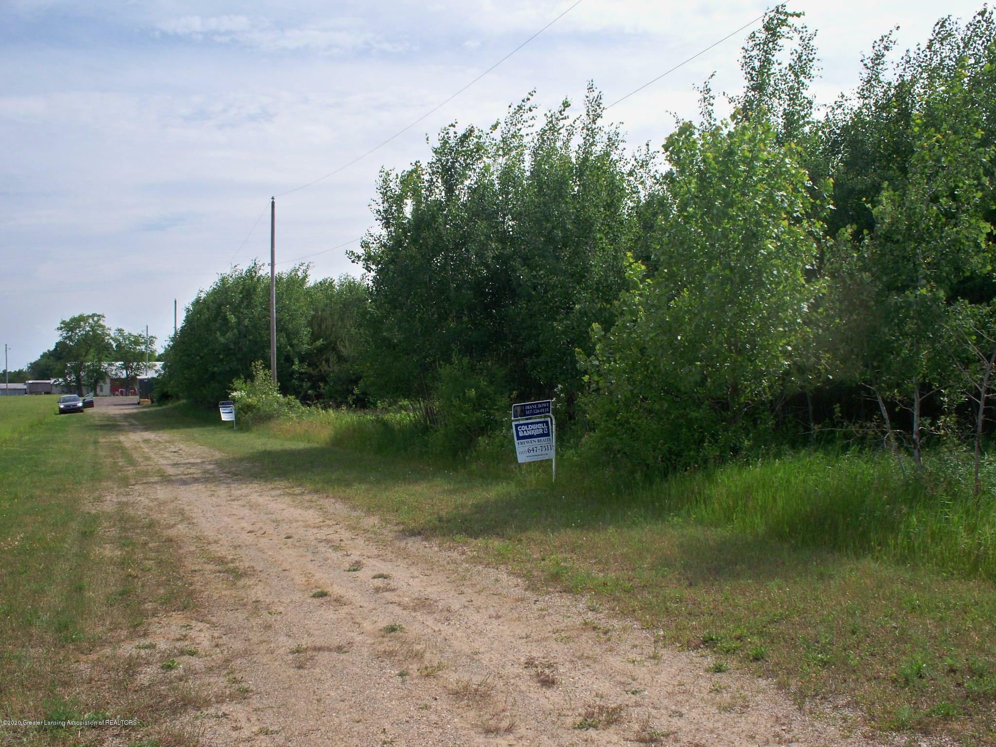 Property Photo:  3 Sebewa Creek Drive  MI 48890 