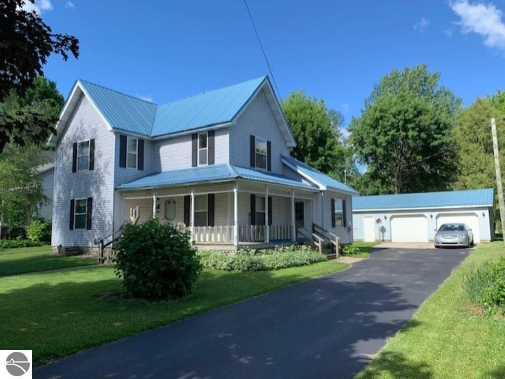 Property Photo:  210 S Pine  MI 48880 