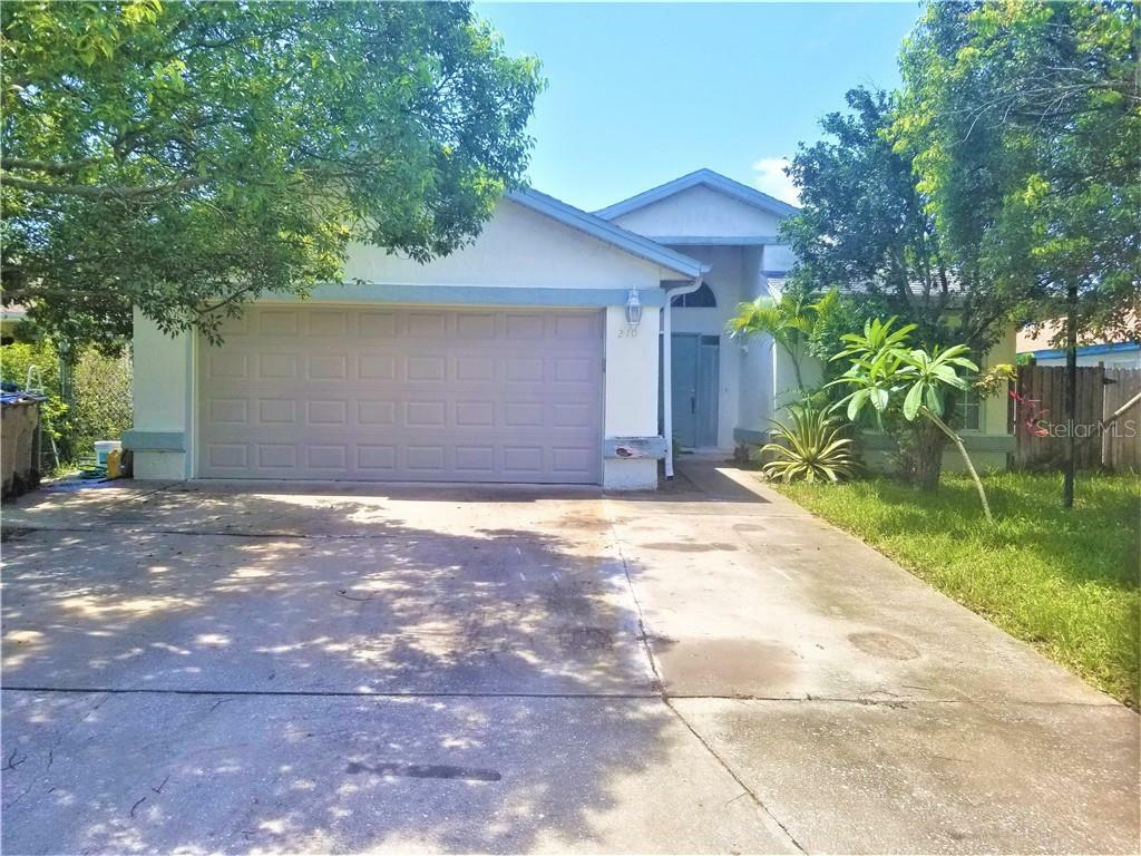 Property Photo:  210 Seabreeze Circle  FL 34743 