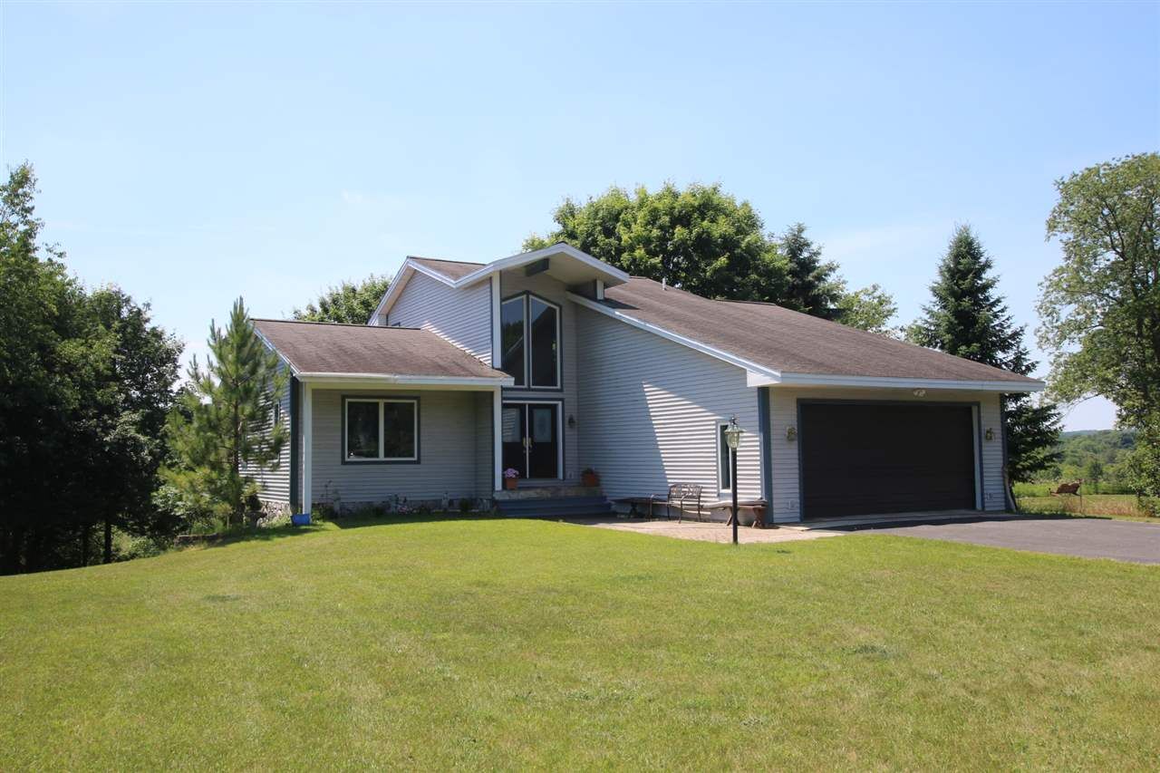 Property Photo:  810 State  MI 49712 