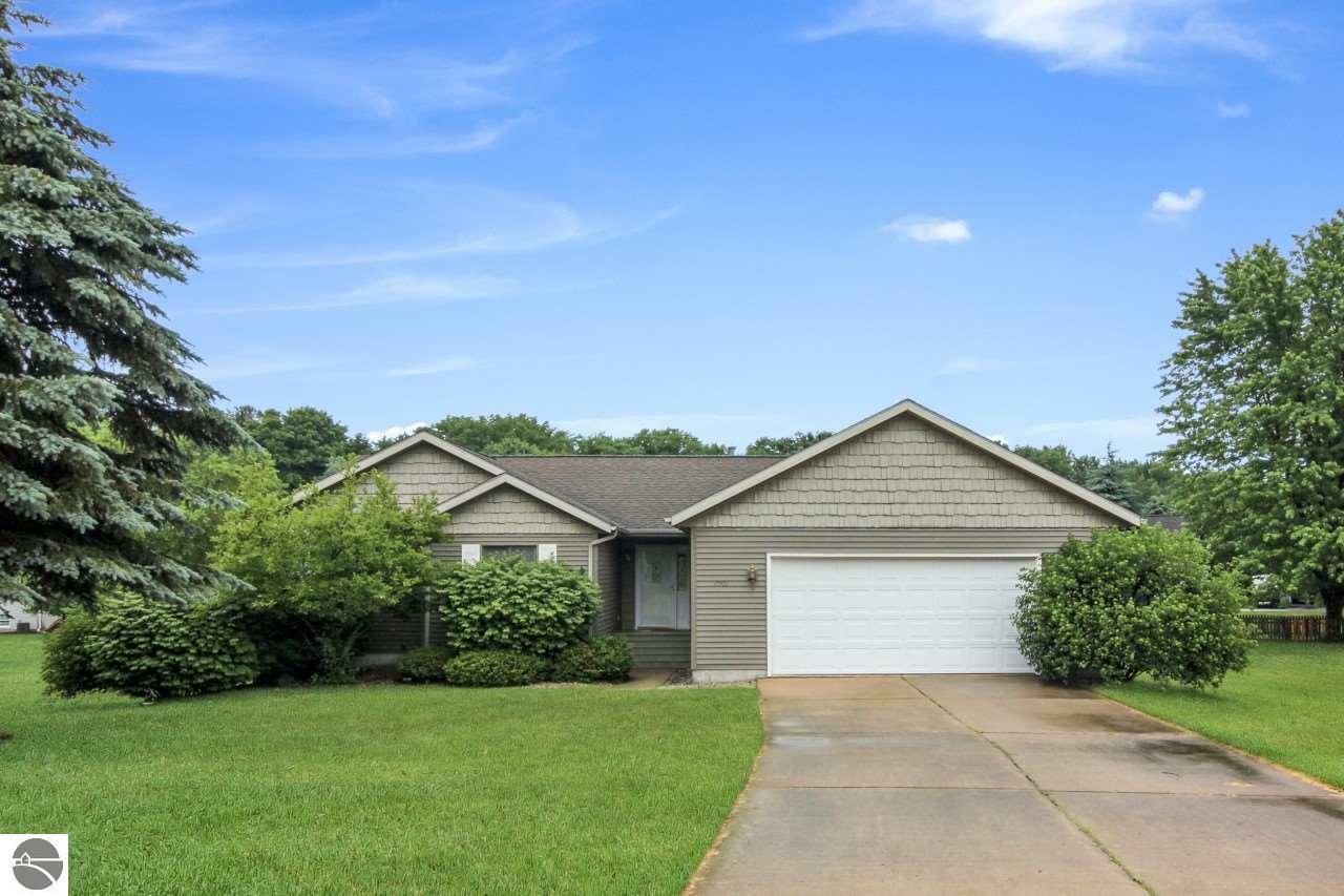 Property Photo:  7901 Pinedale Drive  MI 49690 