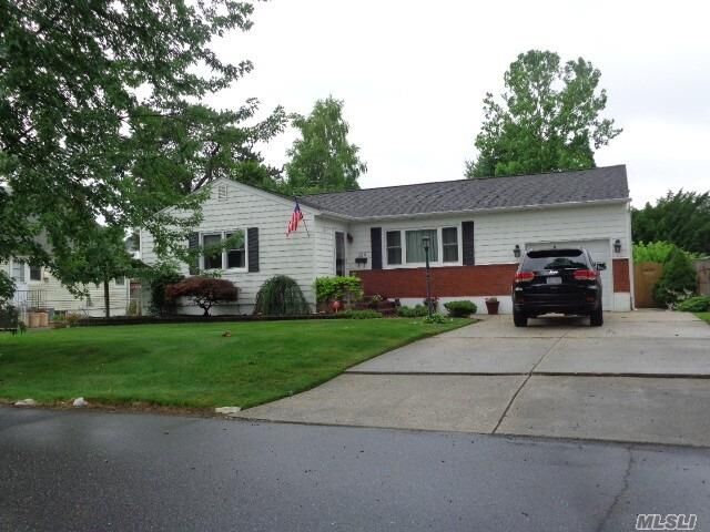 Property Photo:  129 Garretson Avenue  NY 11751 
