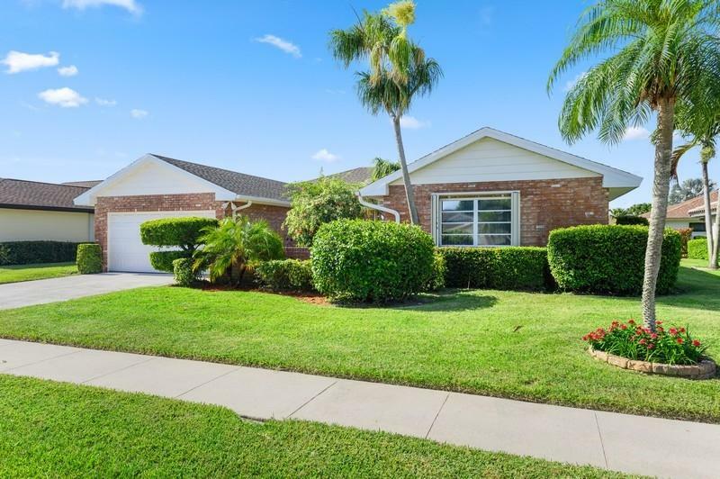 Property Photo:  10707 Greentrail Drive South  FL 33436 