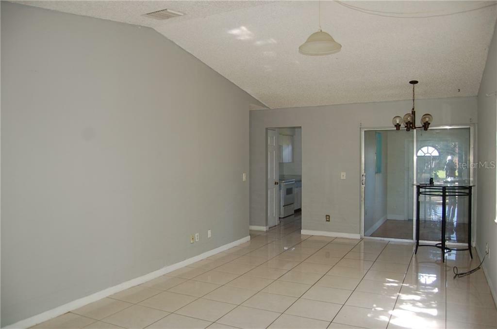 Property Photo:  5949 Branch Drive  FL 32822 