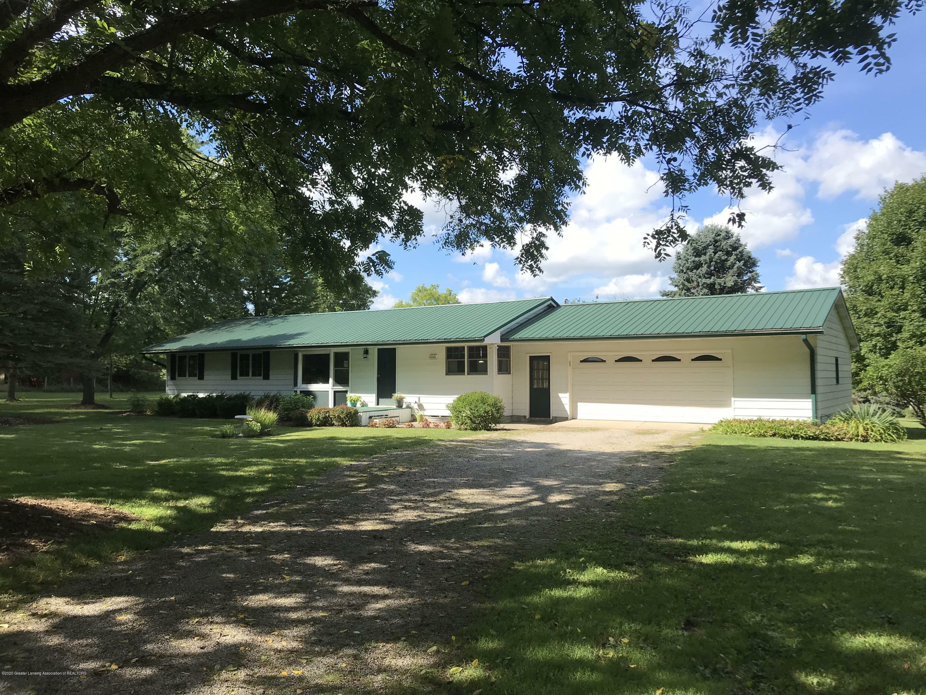 Property Photo:  7840 Colby Lake Road  MI 48848 