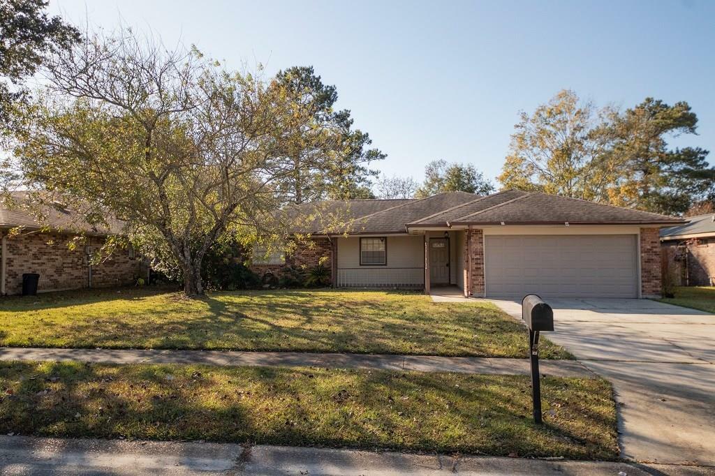 Property Photo:  709 S Lake Caddo Court  LA 70461 