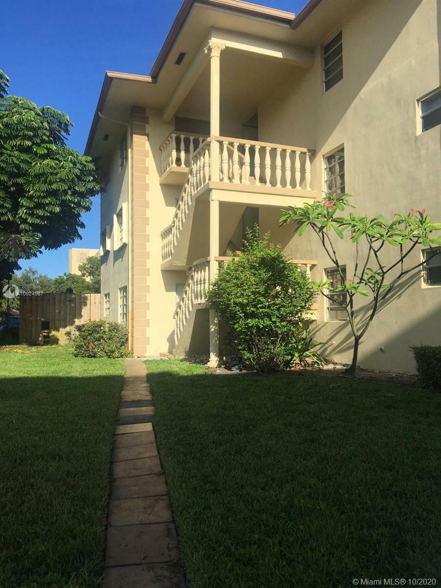 Property Photo:  900 Tallwood Ave 103  FL 33021 