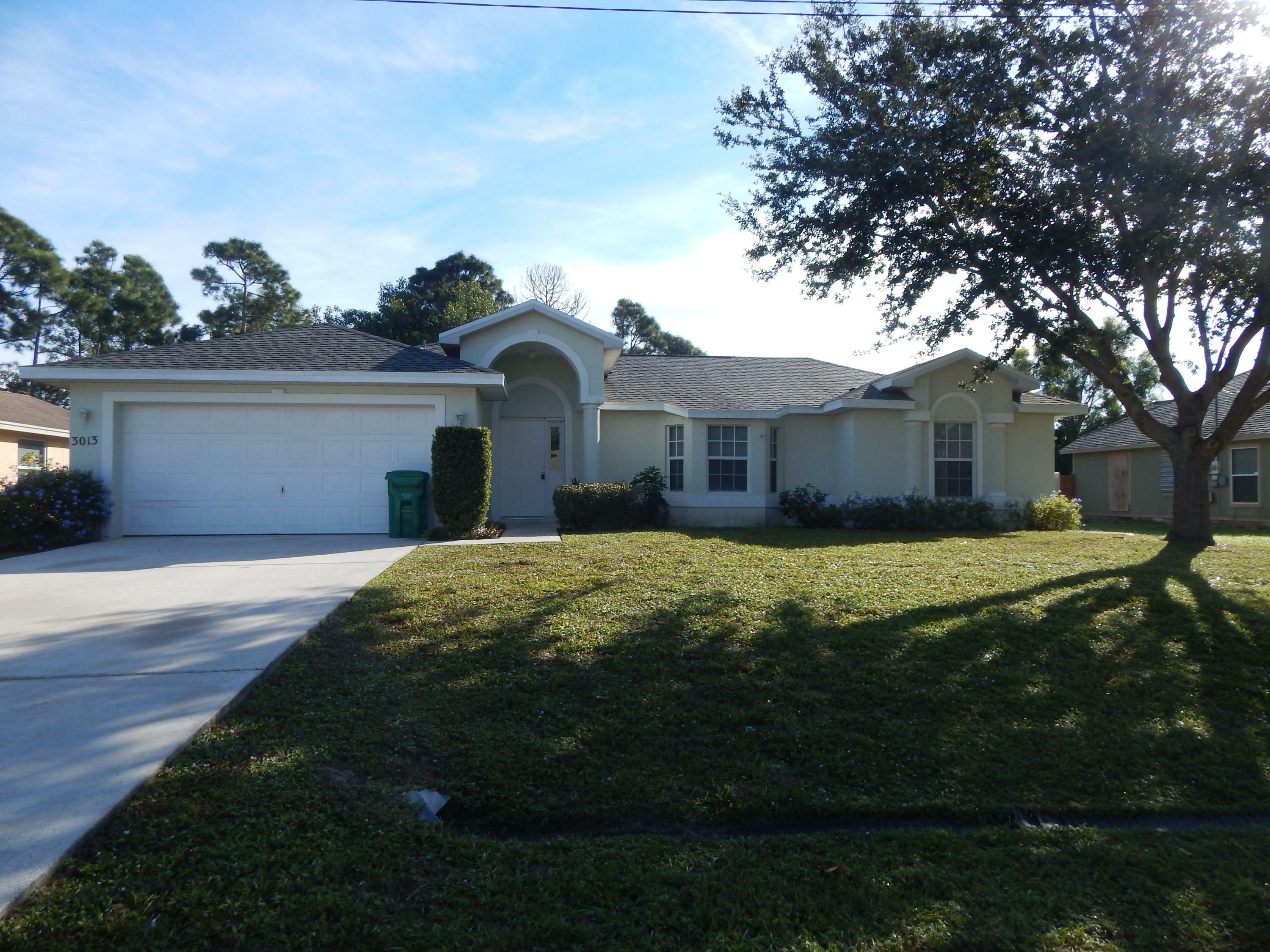 Property Photo:  3013 SW Ann Arbor Road  FL 34953 